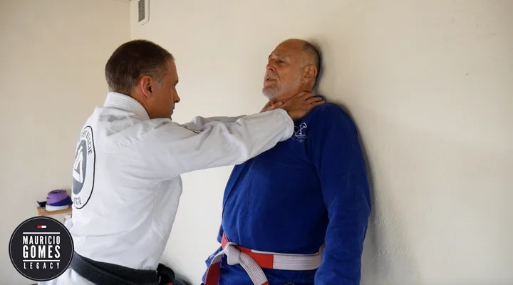 Defence Against a Two-Handed Strangle with Back to the Wall